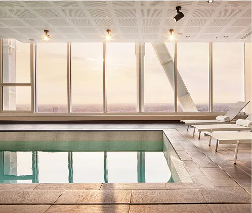 Inside pool with beds in front of great windowfront