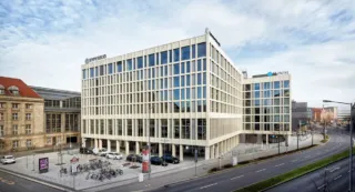 View on big hotel building next to road