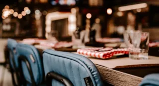 Blurred picture of the back of a blue leather chair