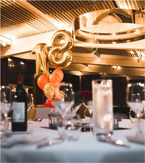 Party table with golden balloons